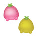 Pink and yellow fruit-shaped objects with green tops on a white background