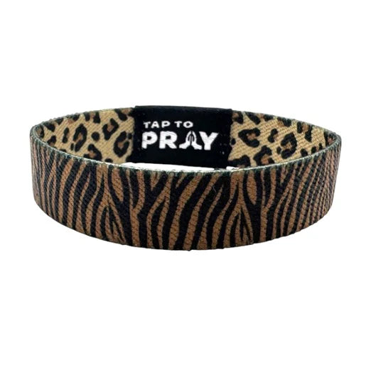 Leopard print headband with 'Tap to Pray' label on a white background