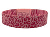 Pink headband with red pattern and 'Tap to Pray' text on a white background