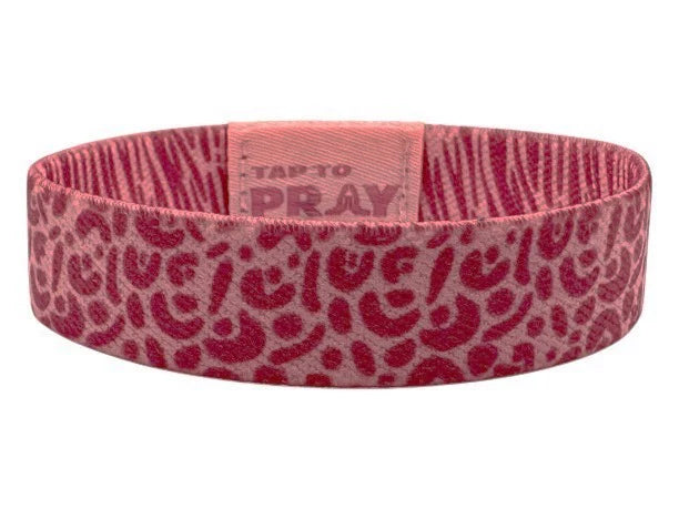 Pink headband with red pattern and 'Tap to Pray' text on a white background