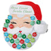 Advent calendar with Santa Claus face and colorful numbers on a white background