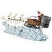 Santa Claus in a sleigh with reindeer on cloud background