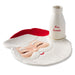 Set with a face-shaped plate, red mitten, and 'For Santa' milk bottle on a white background