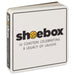 Shoebox packaging with 'shoebox' logo and text on a white background