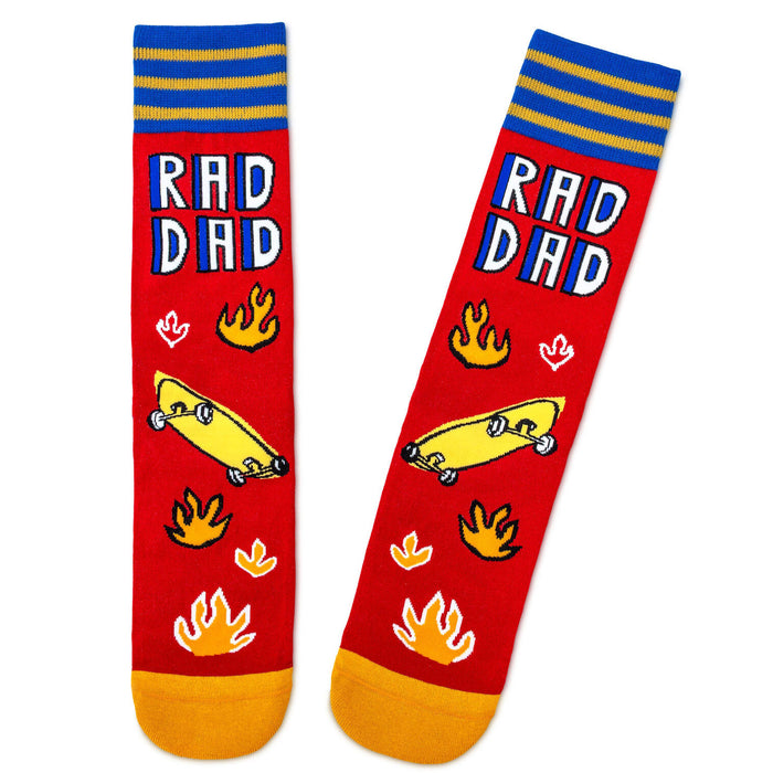 Red socks with 'RAD DAD' text, flames, and a yellow skateboard on a white background