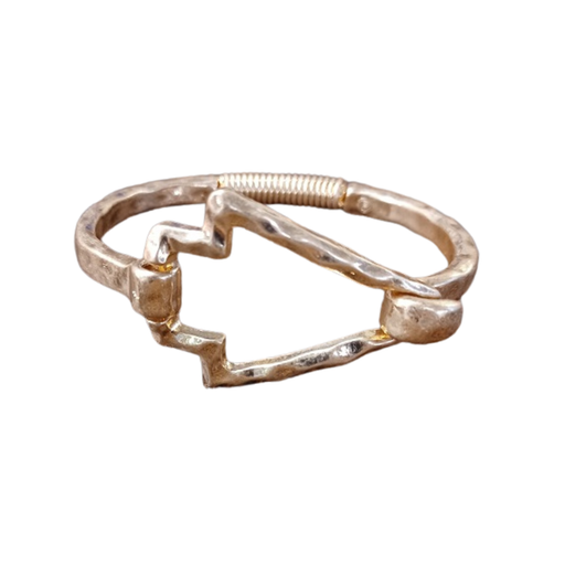 Gold ring with a unique design on a white background