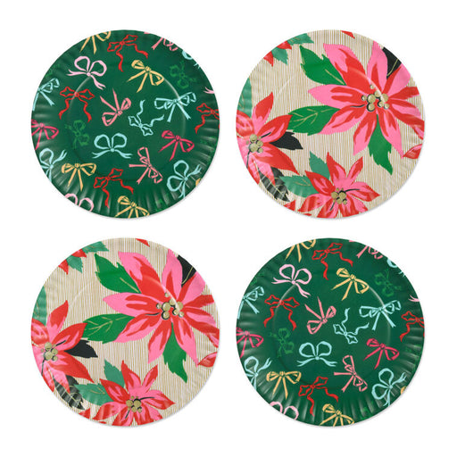 Four round paper plates with festive designs on a white background