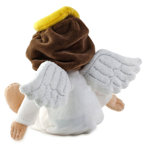 Plush toy angel with brown hair and yellow headband on a white background
