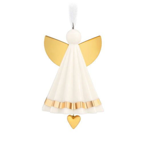 Decorative angel ornament with gold wings and a heart on a white background