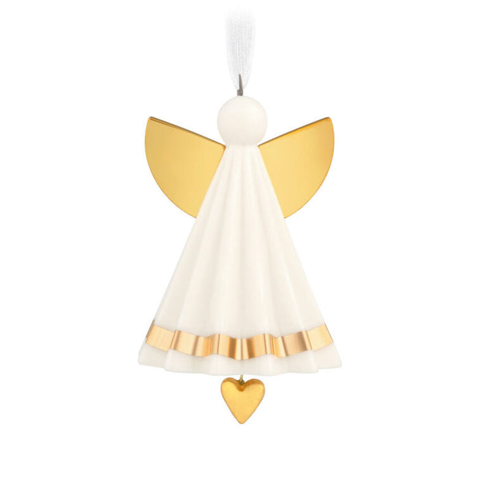 Decorative angel ornament with gold wings and a heart on a white background
