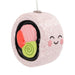 Decorative ornament shaped like a rice ball with smiley face, pink salmon, and green avocado inside on a white background.