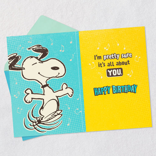 Birthday card with Snoopy dancing on a blue and yellow background