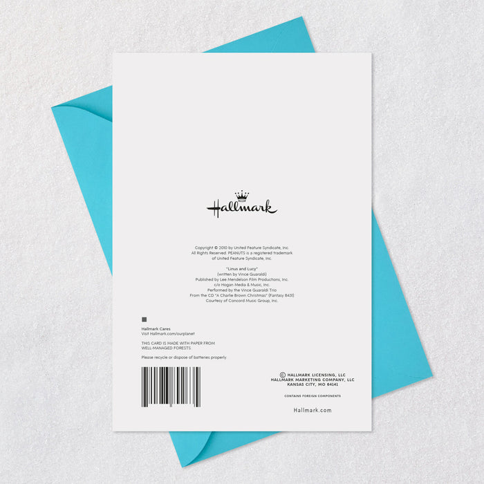Hallmark card with blue envelope on a textured white background