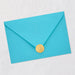 Blue envelope with a gold seal on a light gray background