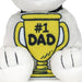 Plush toy with a '#1 Dad' trophy on a white background