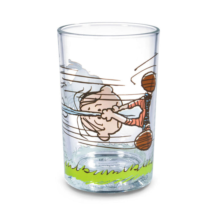 Clear glass with cartoon design of a person playing baseball on a white background