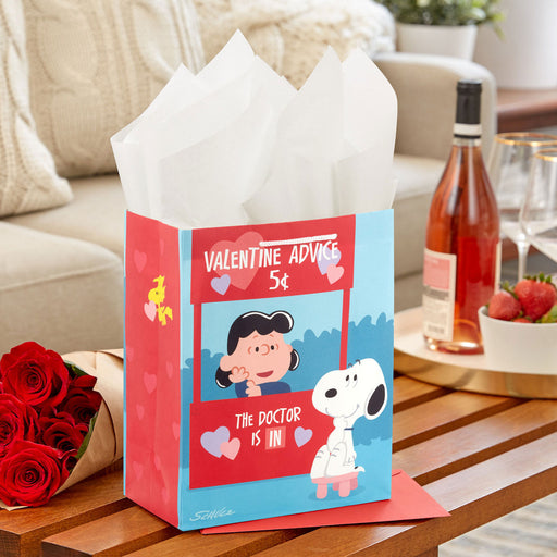 https://trudyshallmark.com/cdn/shop/files/Snoopy-and-Lucy-Medium-Valentines-Day-Gift-Bag_1VGB2002_02_512x512.jpg?v=1704413161