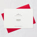 White card with red envelope on a light gray background