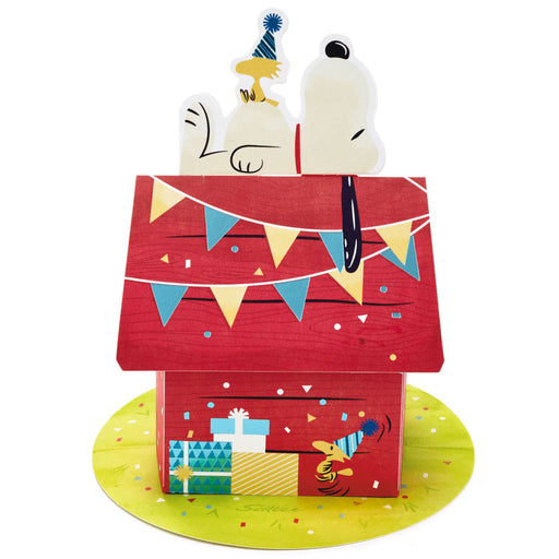 Red gift box with cartoon characters and festive decorations on a white background