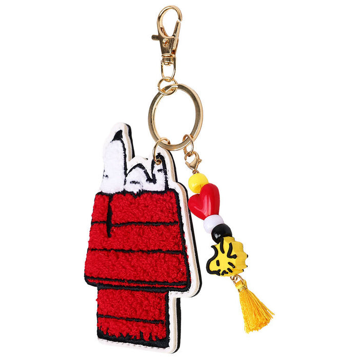 Keychain with Snoopy and Woodstock design on a white background