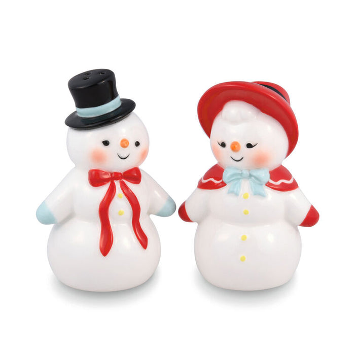Two snowman figurines with top hats and scarves on a white background