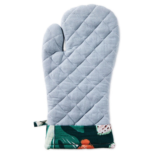 Blue quilted oven mitt with floral pattern on a white background