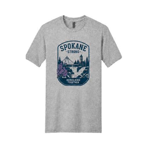 A heather gray short-sleeve crewneck t-shirt featuring a vintage-style graphic on the chest with the text 'SPOKANE STRONG' and 'BUILDING TOGETHER' surrounding an illustration of a bridge, trees, and a waterfall.