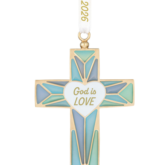 Decorative cross ornament with 'God is Love' text on a white background