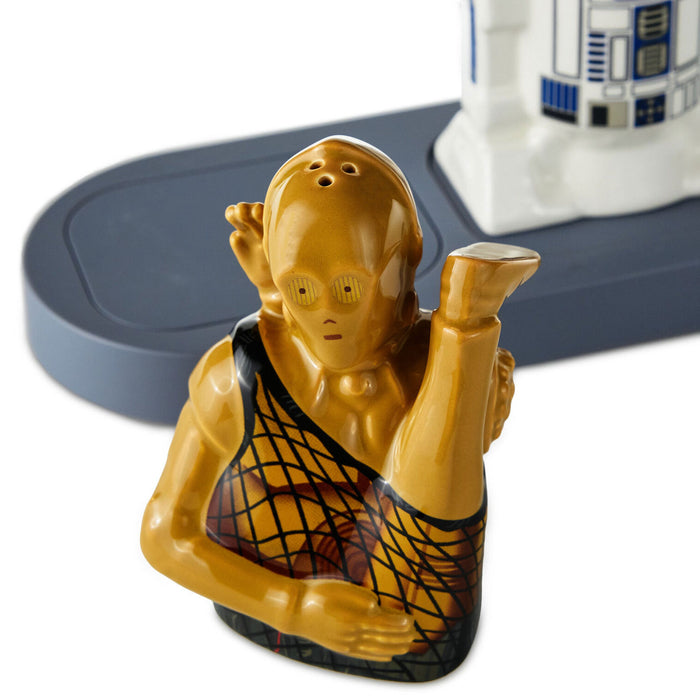 Ceramic figure resembling a character from a science fiction series on a white background