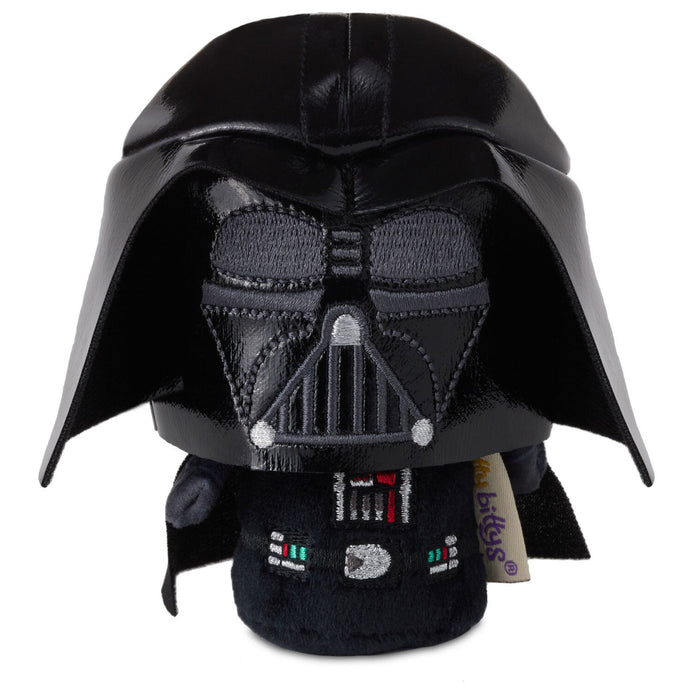 Plush toy resembling Darth Vader from Star Wars on a white background