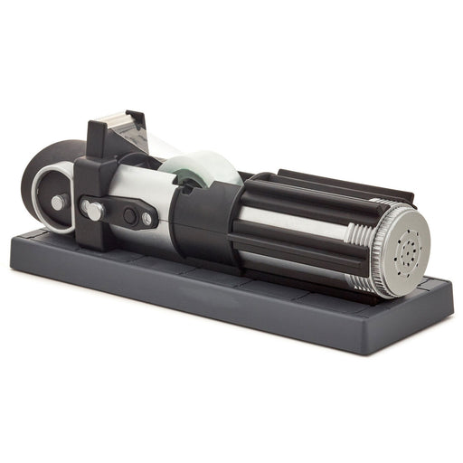 Black and silver tape dispenser on a white background