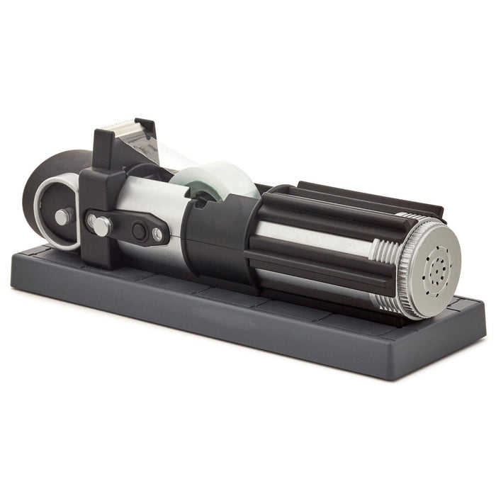 Black and silver tape dispenser on a white background