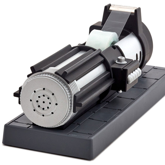 Close-up of a mechanical device with cylindrical components on a white background