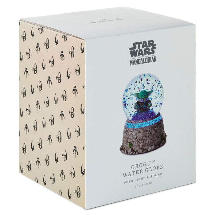 Box packaging of a Star Wars Mandalorian Grogu water globe with light and sound on a white background.
