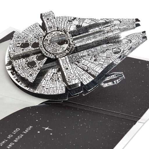 3D model of the Millennium Falcon spaceship on a black background