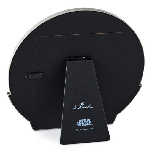Black stand with 'Hallmark' and 'Star Wars' branding on a white background