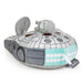 Plush toy resembling a spaceship with a visible brand label on a white background