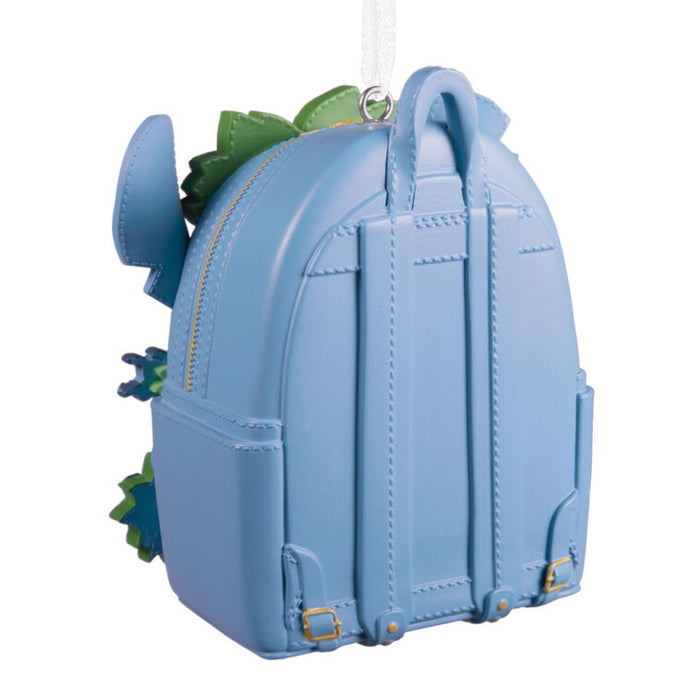 A light blue faux leather backpack ornament featuring Mickey Mouse-inspired ears and green leaf details, shown on a plain white background.