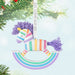Colorful rocking horse ornament with tassels on a light blue background