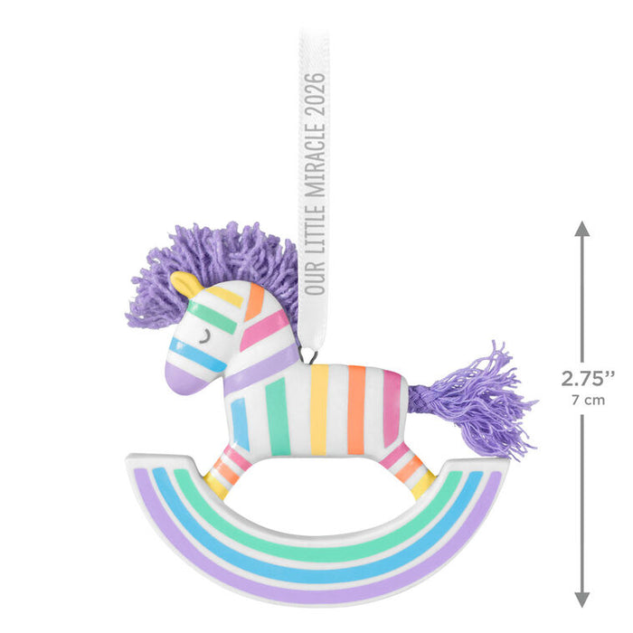 Colorful rocking horse toy with dimensions on a white background