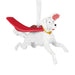 A white dog Christmas ornament depicted in a running pose, wearing a red saddle and a yellow bandana, hanging from a white ribbon on a plain white background.