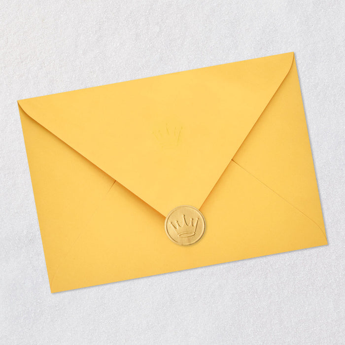 Yellow envelope with a gold seal on a light gray background