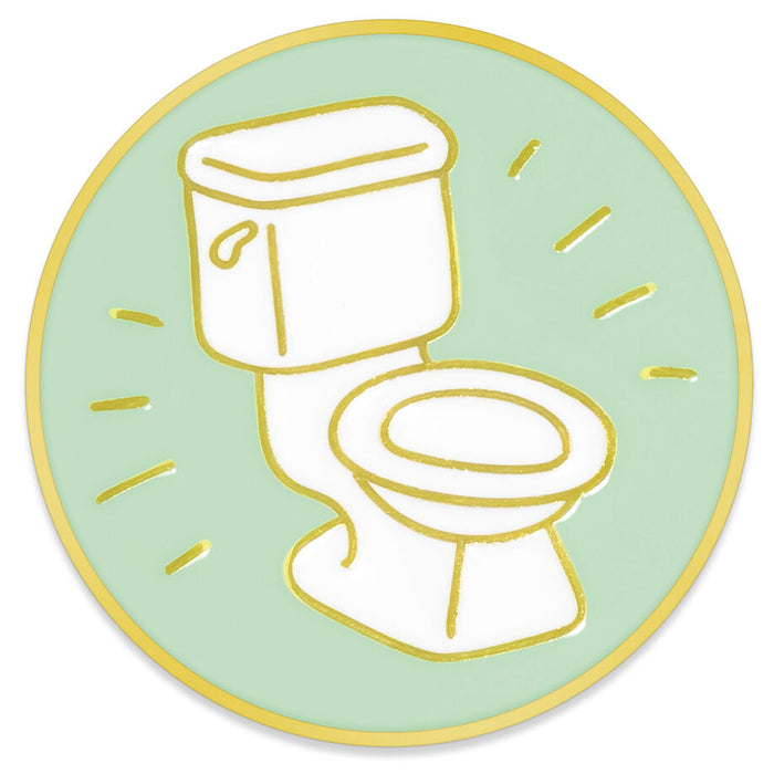 A circular enamel pin featuring a white toilet illustration outlined in gold on a pale mint green background with gold rays and a gold border.