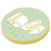 Circular object with a toilet illustration on a light green background