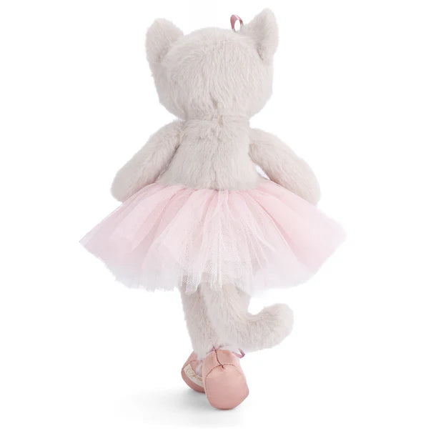 Plush toy with a cat design wearing a pink tutu on a white background