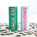 Two tumblers with 'Rack Em' and 'Mah Jong' text, surrounded by dominoes on a light background.