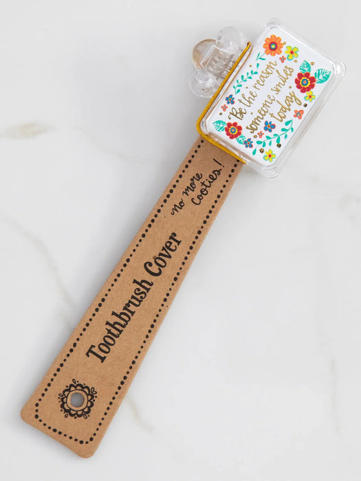 Toothbrush cover with decorative packaging on a white background