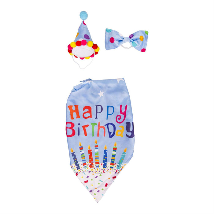 Dog birthday outfit with hat, bow tie, and bib on a white background