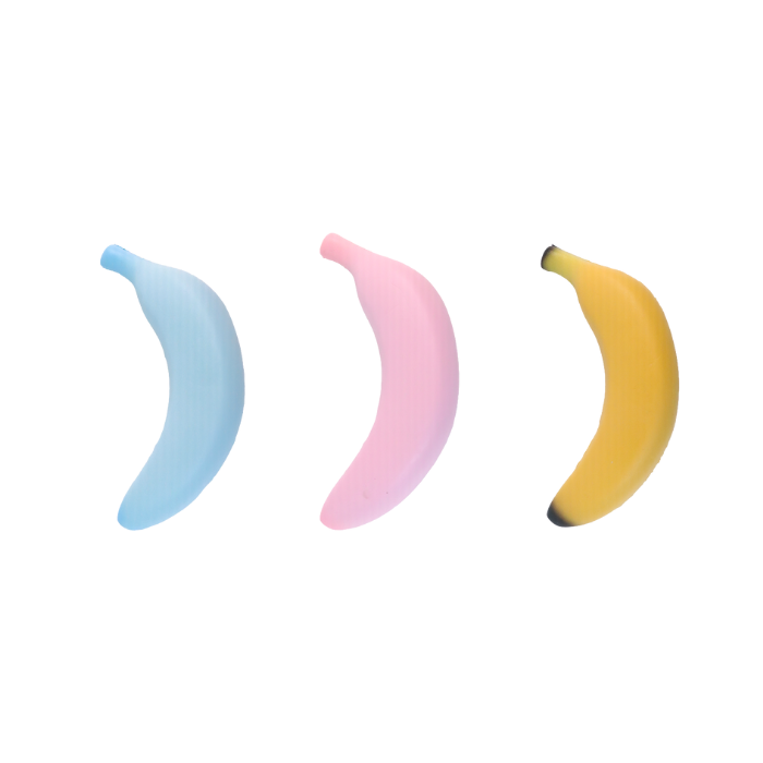 A blue, pink, and yellow banana toys on a white background