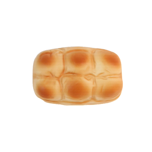 Bread-shaped toy on a white background